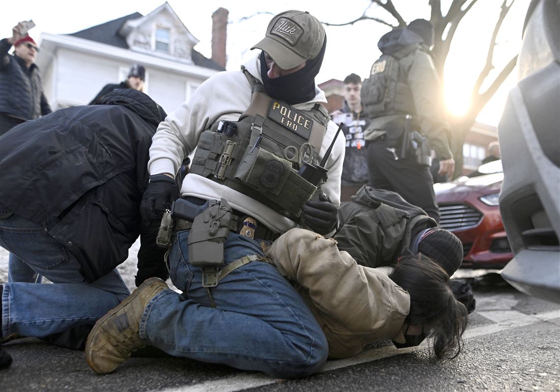 Police officers arresting suspect on the ground Police officers arresting suspect on the ground