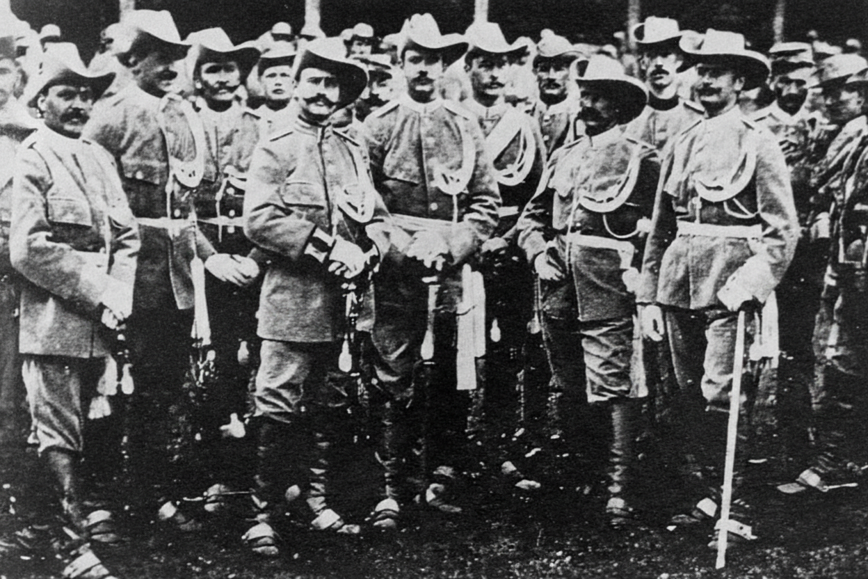 Soldiers in uniform standing together in a historic setting